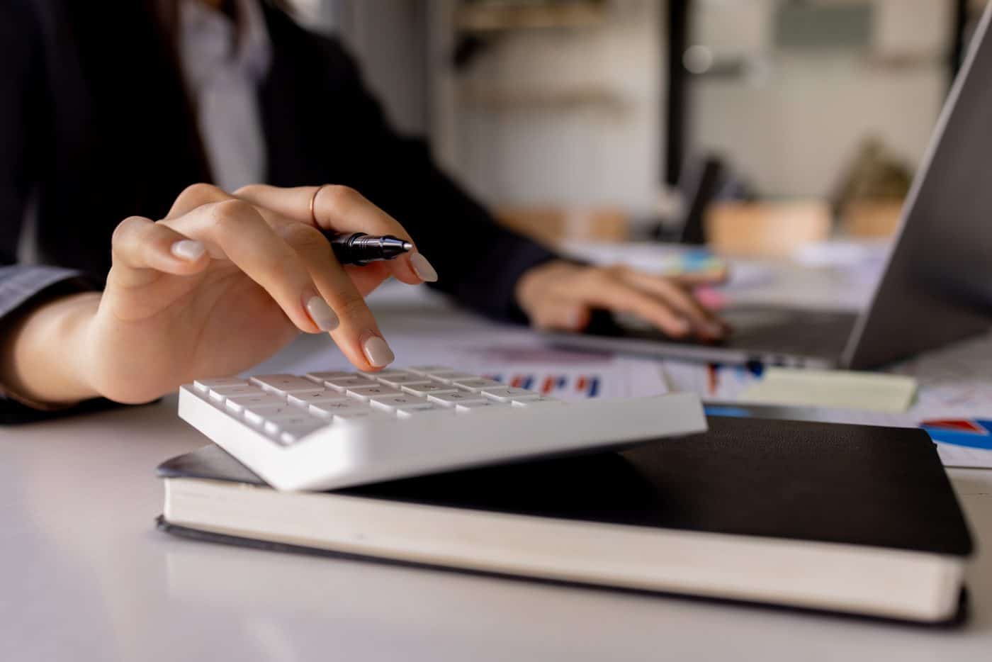 Close-up of an accountant using a calculator
